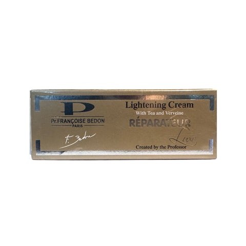 Gold packaging of  Pr Francoise Bedon REPARATEUR lightening cream tube  on a white background